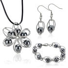 Schmucksest bestehend aus Ohrringen, Anh&auml;nger und Armband