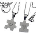 Partneranh&auml;nger - Puzzle Herzmotiv  Vorderseite  mit individueller Gravur auf der R&uuml;ckseite