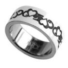 Steel ring with lasered hearts as design